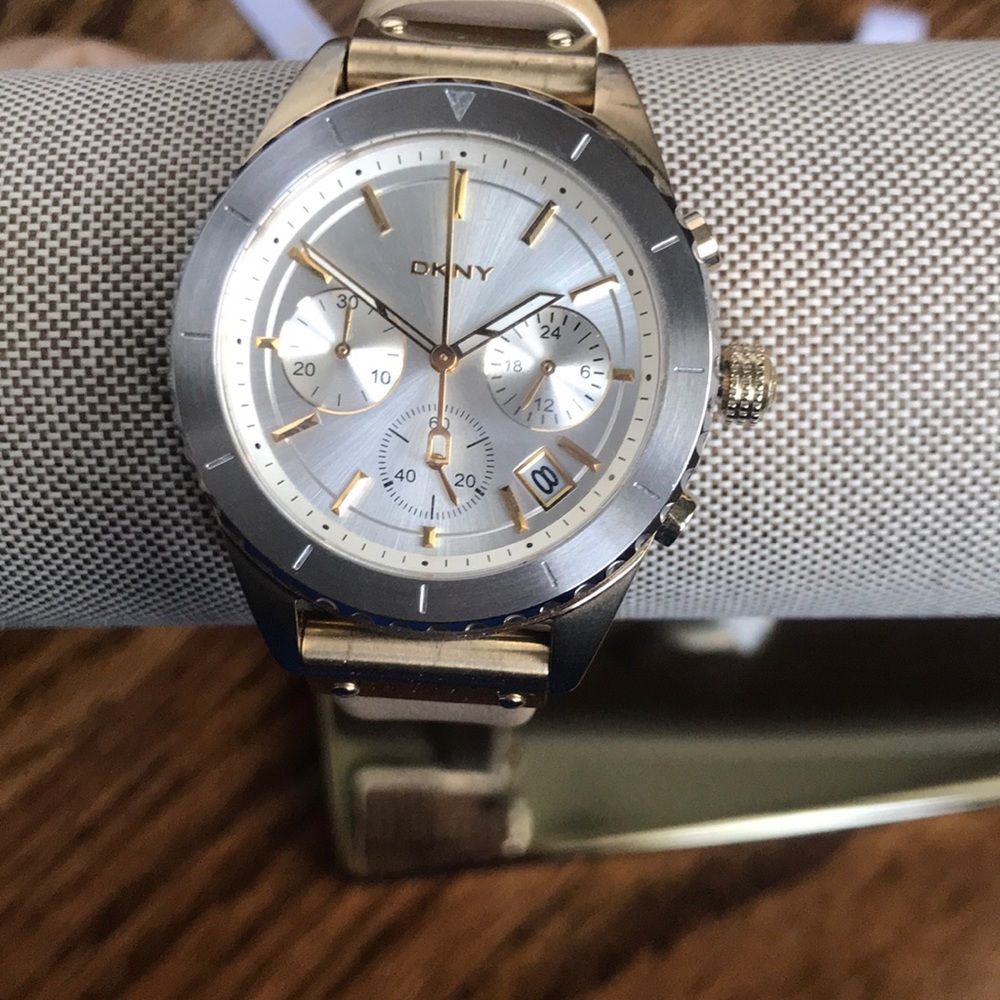Gold and silver face with beige band